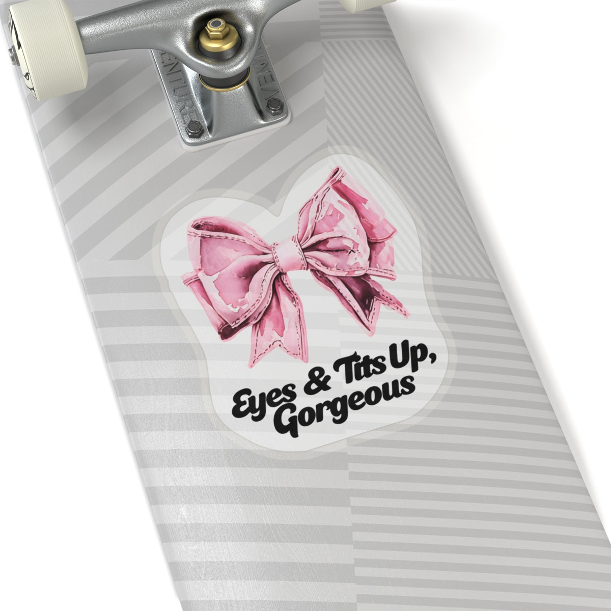 Eyes & tits up sticker on a skateboard